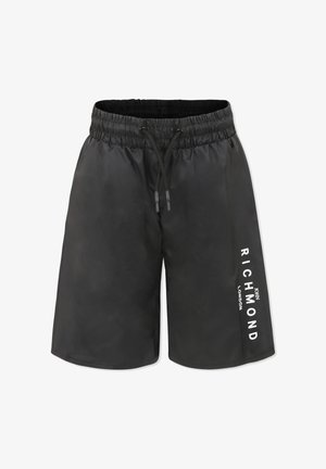 Pantaloni da bagno neri con vita elastica e cordino. Dettagli laterali con la scritta "RICHMOND LONDON" stampata in bianco. Texture liscia.