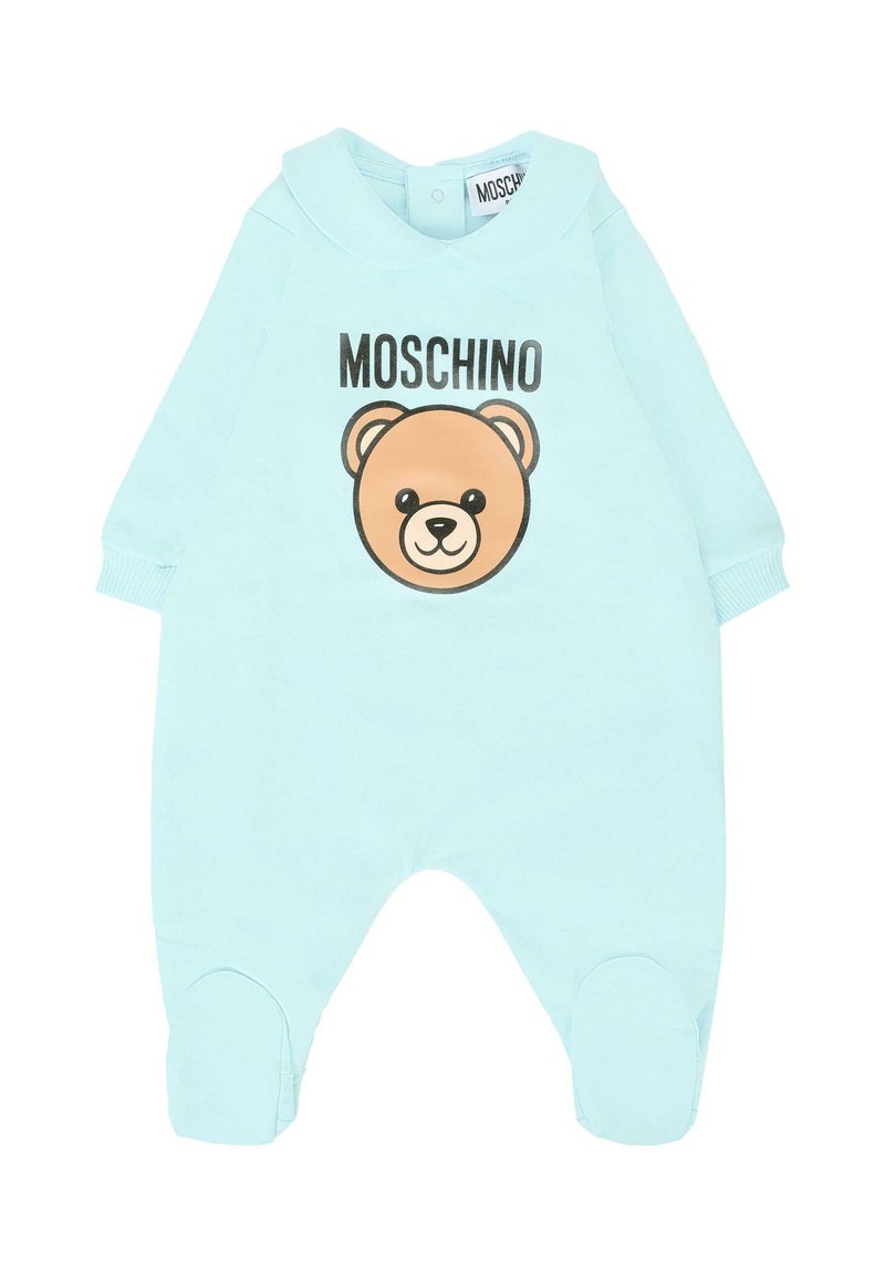 Tutina azzurra con maniche lunghe, caratterizzata da una grafica di un orso marrone e il testo "MOSCHINO". Tessuto morbido e design con colletto arrotondato.