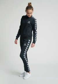 Hummel NELLY ZIP JACKET - Träningsjacka - black