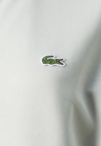 Lacoste Tröja med dragkedja - stone