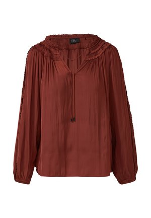 Rust-colored blouse with a pleated neckline and long sleeves. Soft, flowing fabric with a V-neck and drawstring detail at the front.
