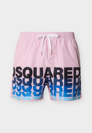 Rosa Badeshorts mit weißem Kordelzug und kräftigem schwarzen bis blauen Farbverlauf mit dem Schriftzug "DSQUARED2" auf der Vorderseite.