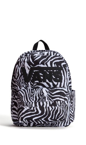 Zaino a righe zebrate bianche e nere con tasca frontale e grande logo Vans nero sul davanti su sfondo bianco.
