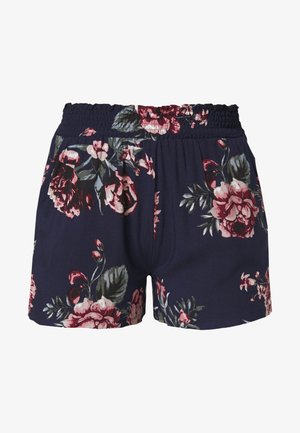 Pantalones cortos azul marino con cintura elástica que presentan grandes patrones florales en rosa y rojo con hojas verdes.