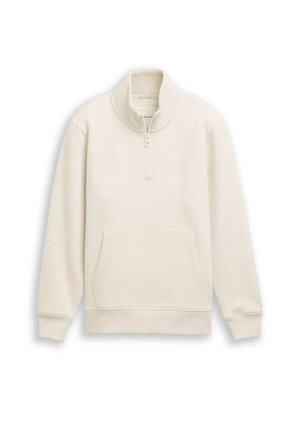 Sweat-shirt crème à col haut, zip quart et poche kangourou sur le devant. Texture douce et poignets côtelés.