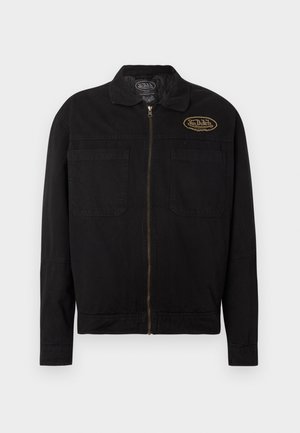 Μαύρο μπουφάν με φερμουάρ, δύο μπροστινές τσέπες και μικρό οβάλ λογότυπο Van Dutch στο πάνω αριστερό μέρος του στήθους.