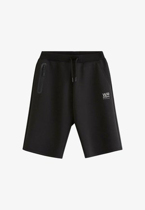 Sorte atletikshorts med snøre i taljen, lynlåslomme på venstre lår og lille hvidt logo på højre lår.