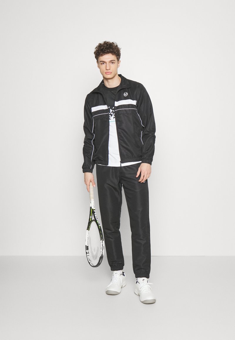 Veste Sergio Tacchini Vintage Années 80 - Survêtement Bleu Satin - Taille M - Occasion Très Bon État