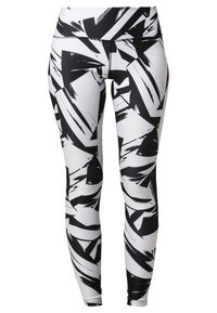 Leggings blancas de cintura alta con un audaz patrón de pinceladas abstractas en negro que cubre toda la tela.