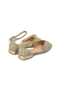 Ballet flat dorate con applicazioni di strass, design con ritagli e un piccolo tacco a blocco. Cinghietto alla caviglia regolabile per una vestibilità sicura.