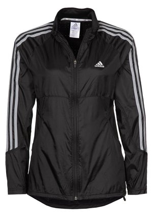 Veste de sport noire Adidas avec fermeture éclair complète à l'avant, trois bandes blanches sur les manches et logo Adidas sur la poitrine.