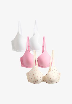 Zwei weiße, zwei rosa und ein cremefarbener BH mit kleinem roten Blumenmuster, in überlappenden Reihen auf weißem Hintergrund angeordnet.