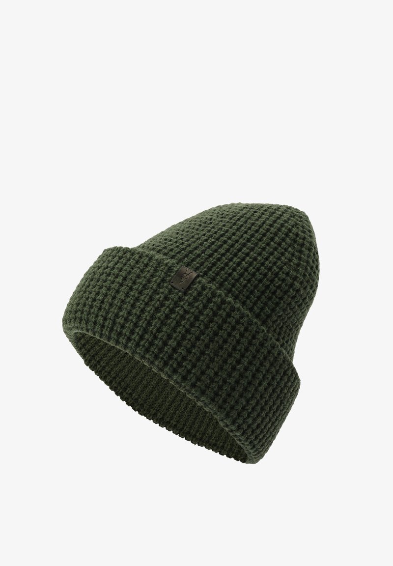 Knit green beanie with a textured pattern, featuring a folded cuff and a small black logo patch on the side.