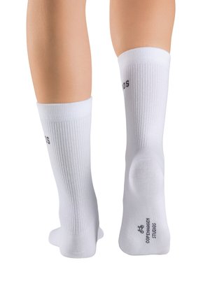 White knee-high socks with ribbed texture, logo on the upper side, and a smooth finish at the sole, designed for comfort and durability.