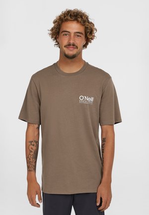Brown cotton t-shirt with short sleeves, crew neckline, and a white logo on the left chest. Smooth texture and relaxed fit.