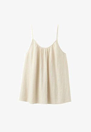 Top ampio senza maniche color crema con sottili spalline a spaghetti e scollo arricciato, realizzato in un tessuto leggero e strutturato.