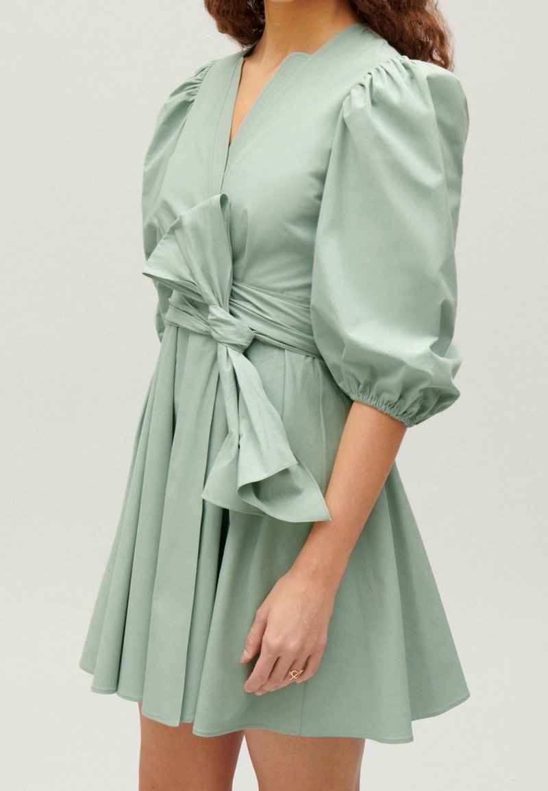 claudie pierlot green dress Mani Bhatia — Aqua Green Sequins Embroidered Slit Lehenga – Fabilicious  Fashion main image 0
