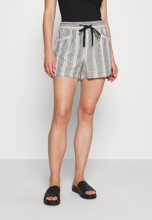 Gestreepte, lichte shorts in zwart en wit met een elastische tailleband en een trekkoord. Bevat twee voorzakken en heeft een relaxte pasvorm.