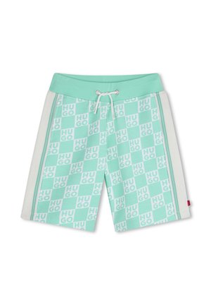 Shorts de bain vert menthe avec un motif en damier portant le mot "HUGO", complétés par une ceinture assortie et un cordon de serrage.