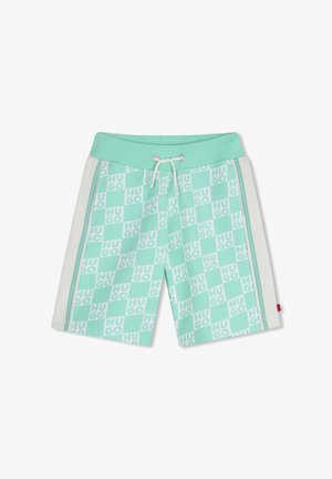 Shorts de bain vert menthe avec un motif en damier portant le mot "HUGO", complétés par une ceinture assortie et un cordon de serrage.