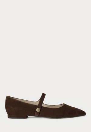 Brown suede flat shoe with a pointed toe, single strap across the instep, and a gold-toned circular button accent. Low heel design.
