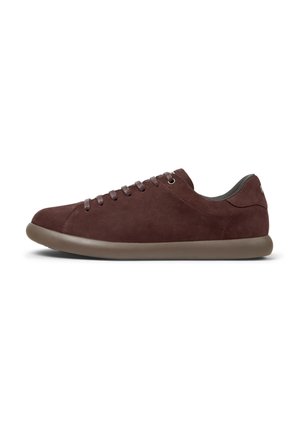 Brown suede sneakers with a rounded toe, seven eyelets, and grey accents. The sole is tan, designed for casual wear with a smooth texture.