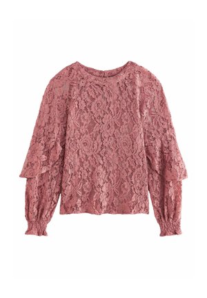 Spetsblus i dammig rosa med långa puffärmar och rund halsringning. Har blommönster och elastiska ärmslut. Mjuk, texturerad tyg.