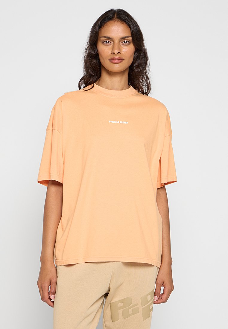 Pegador T-shirt print abrikoos Pegador T-shirt print abrikoos