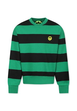 Felpa a righe verde e nera con maniche lunghe, scollatura rotonda e un patch a forma di faccina sorridente gialla sul petto.