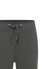 Graue Sweatpants mit einem Kordelzugbund, ausgestattet mit silbernen Ösen und einem strukturierten Stoff. Enthält seitliche Taschen und einen glatten Bund.