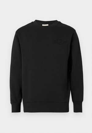 Czarna bluza z długim rękawem i okrągłym dekoltem, z prążkowanymi mankietami i pasem, z subtelnym tonowanym haftowanym logo na lewej piersi.