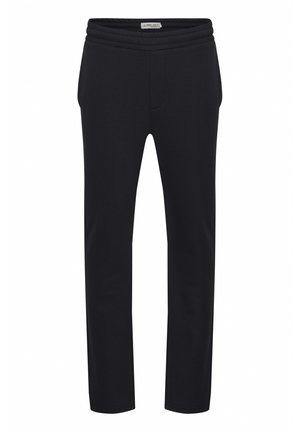 Sorte joggebukser med en innsvingt design, med vid, elastisk midjebånd og sidelommer. Laget av myk, teksturert stoff.
