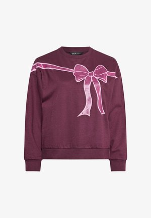 Sweat-shirt long noir avec manches longues, orné d'un design de ruban rose brillant et de nœud sur la poitrine et les épaules.