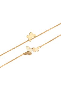 Złota bransoletka łańcuszkowa z trzema sercami o różnych rozmiarach, z polerowanym wykończeniem i delikatnym wzorem ogniw.