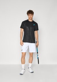 ASICS MATCH CAPSULE TOP - Sport T-Shirt - performance black