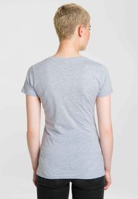 Gray short-sleeve t-shirt made of soft fabric, featuring a round neckline and a fitted silhouette, with a smooth texture and simple design.
