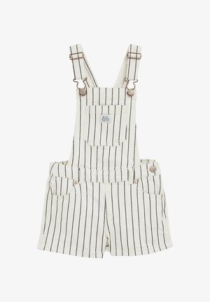 Dryžuoti džinsiniai kombinezonai off-white spalvos su tamsiai mėlynomis juostomis, su reguliuojamomis petnešomis, priekinėmis kišenėmis ir mygtukų detalėmis šoninėje dalyje.