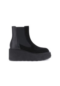 Stivali neri alla caviglia con suola platform, caratterizzati da una combinazione di pelle liscia e suede morbido. Pannelli laterali elasticizzati per una facile calzata.