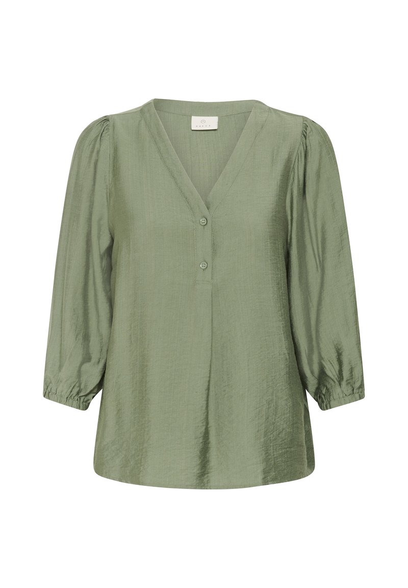Blouse vert clair avec manches ballon trois-quarts, col en V et deux boutons sur la patte de devant, fabriquée en tissu texturé.