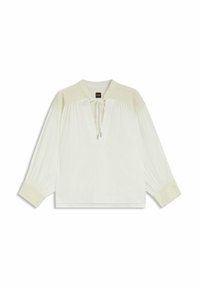 White blouse with embroidered cream accents, long sleeves, a v-neckline with ties, and gathered detailing at the shoulders and sleeves.