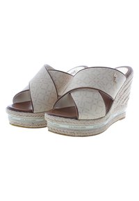 Sandali wedge beige con design a strappo incrociato, accentuati da rifiniture marroni. Dettagli in corda sulla suola, con branding U.S. Polo Assn.