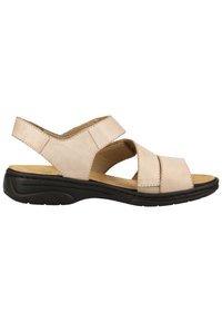 Beige Leder-Sandalette mit zwei breiten Riemen und einem Fersenriemen, ausgestattet mit einer schwarzen Gummisohle und einer gepolsterten Innensohle für Komfort.