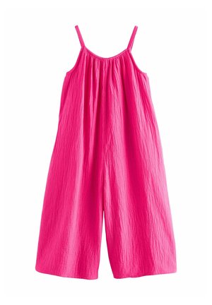 Jasnoružový široký overal bez rukávov s tenkými ramienkami a nariaseným výstrihom vyrobený z textúrovanej látky.