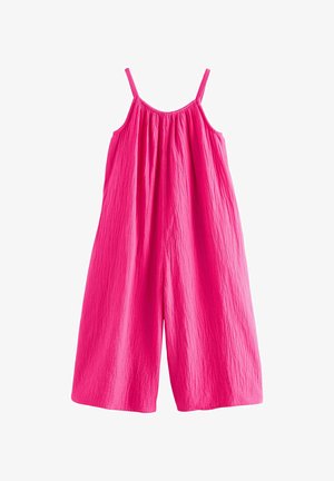 Jasnoružový široký overal bez rukávov s tenkými ramienkami a nariaseným výstrihom vyrobený z textúrovanej látky.