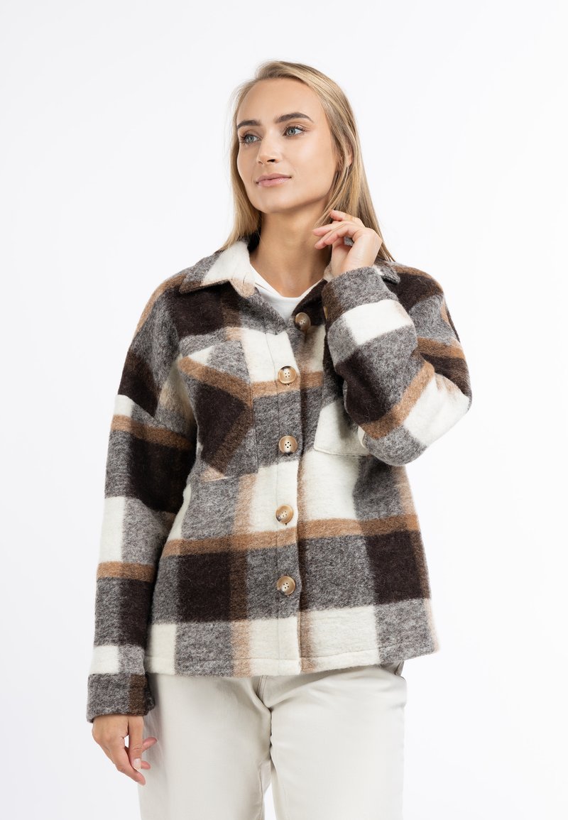 Geruite wollen jas in bruin, beige en roomkleurige tinten, met knoopsluitingen en een kraag. Zachte textuur met een zichtbaar ruitpatroon.