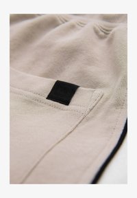 Wybrany, beige