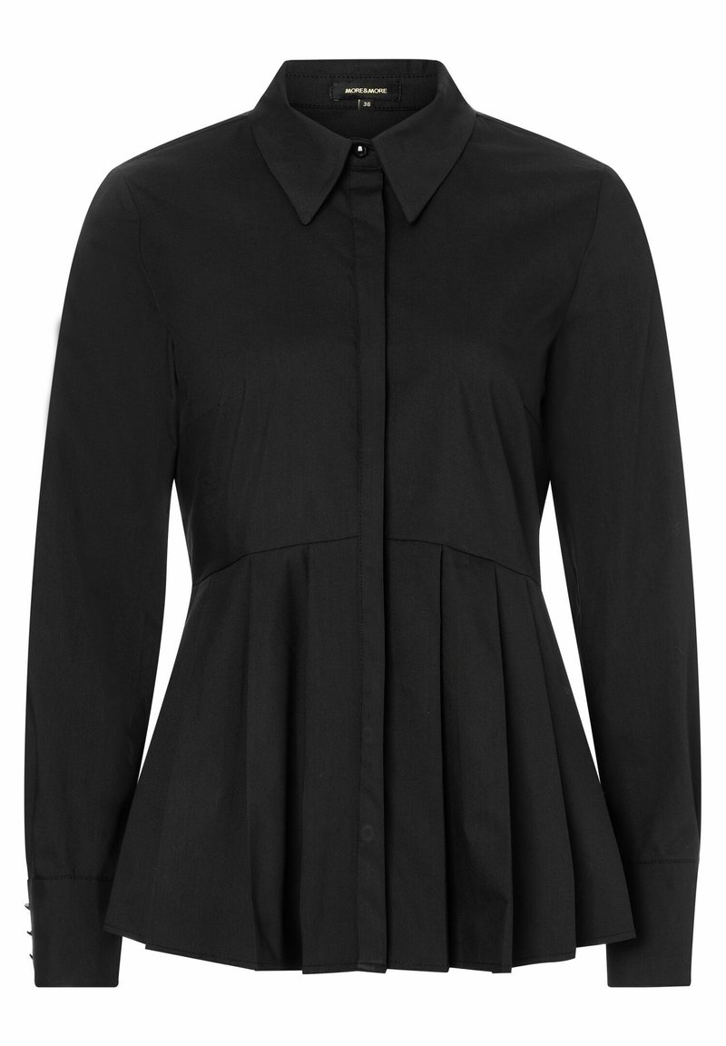 Blouse noire à manches longues avec col pointu, boutonnage devant et détail plissé à la taille pour une silhouette évasée.