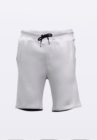 Lys grå treningsshorts laget av teksturert stoff. Har en elastisk midjebånd med sort snor og sort indre fôr.