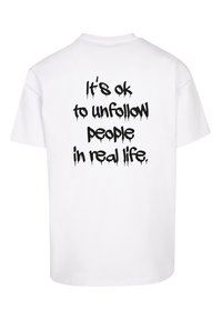 Merchcode UNFOLLOW FRONT  OVERSIZE  - T-shirts med print - white