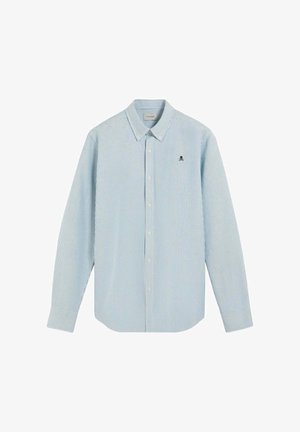 Camicia a maniche lunghe a righe azzurro chiaro con colletto button-down, caratterizzata da un piccolo logo nero sul petto e orlo dritto.